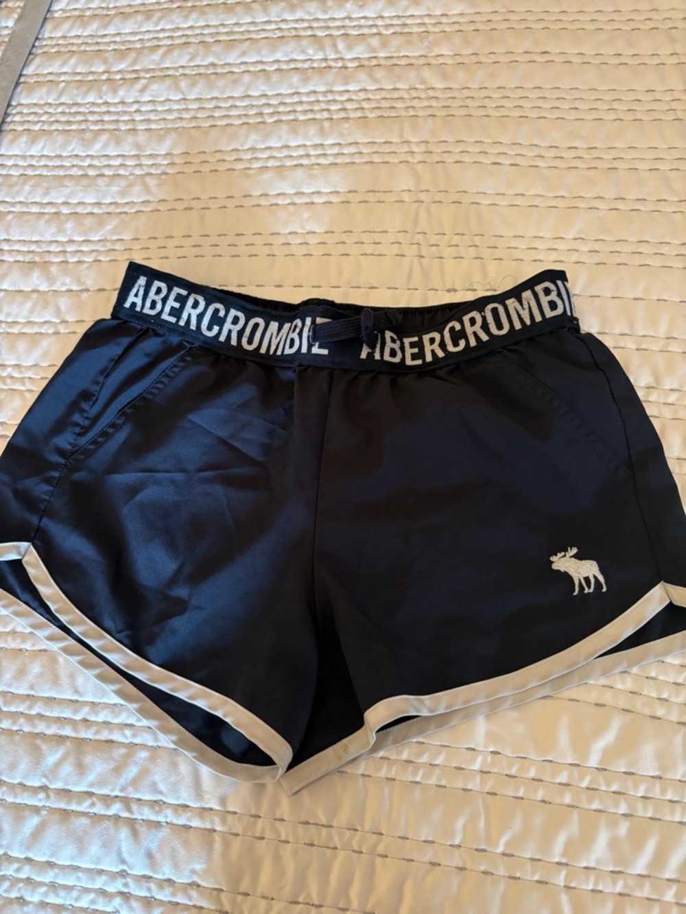 abercrombie kids black athletic shorts with white trim
